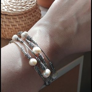 Silver bracelet with man-made pearls